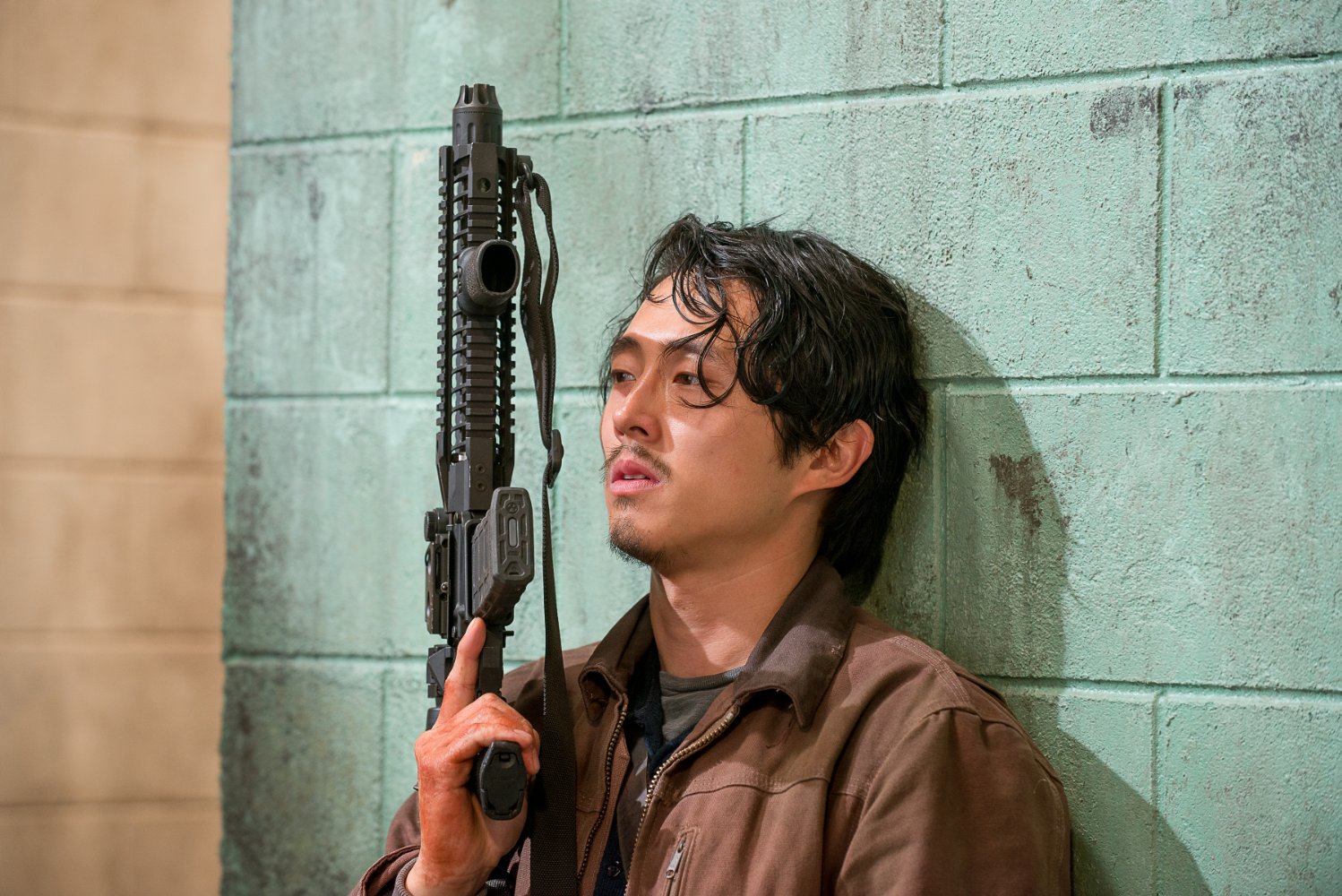 Steven Yeun as Glenn from The Walking Dead. 