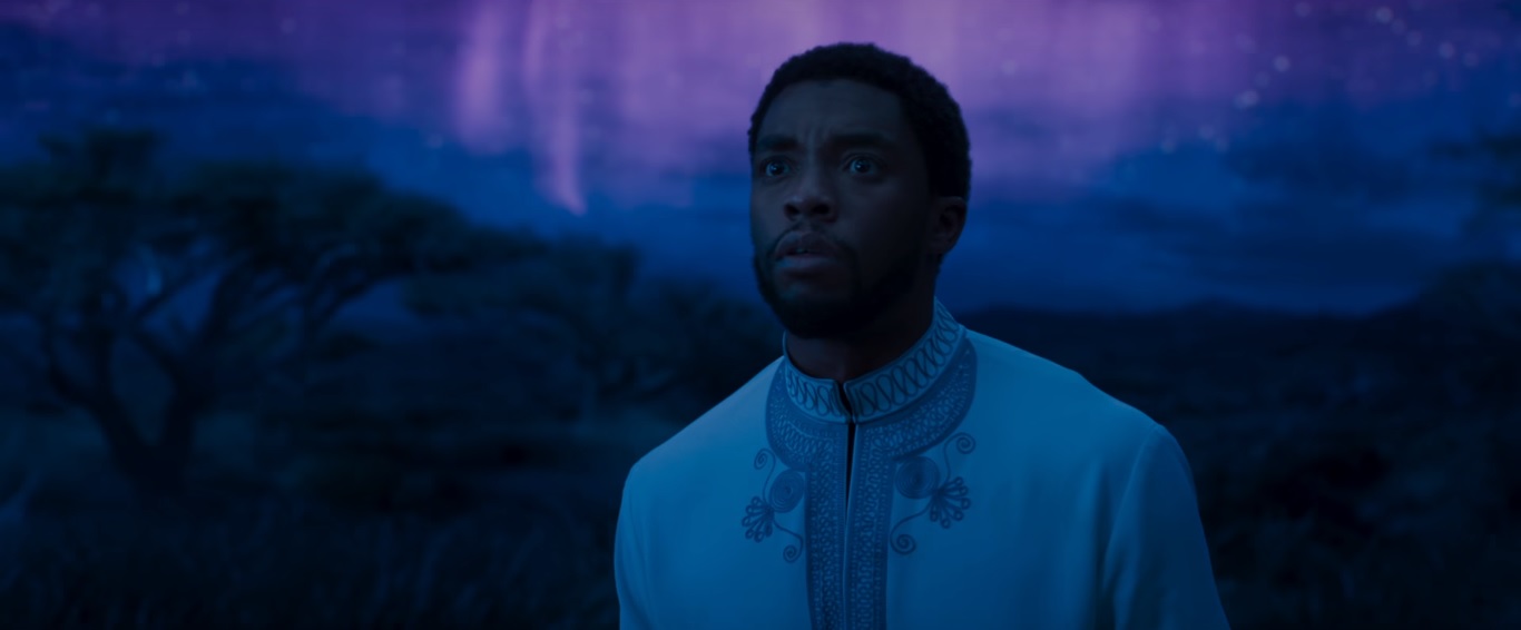 T'Challa in the land of the ancestors, which looks like the African Savannah amid a mysterious blue and purple sky. 