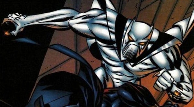 White Wolf, wearing a white Black Panther-esque costume, in battle. 