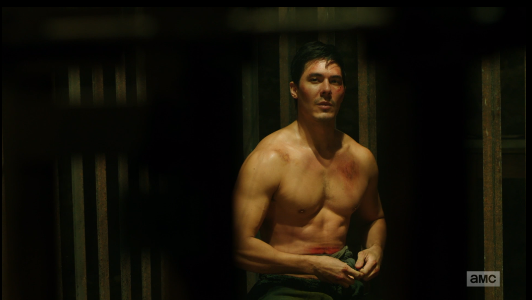 Shirtless Lewis Tan in a prison cell on Into the Badlands. 