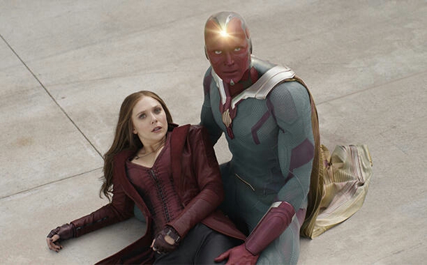 Wanda has fallen on the tarmac and Vision is there cradling her, his soul stone glowing. 