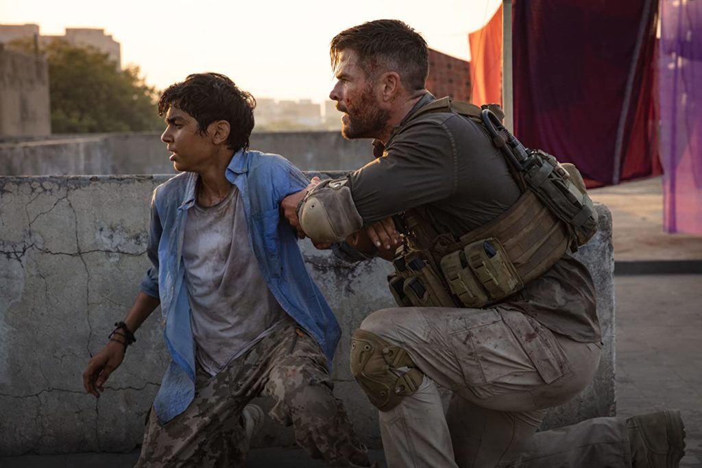 (R-L) Chris Hemsworth and Rudhraksh Jaiswal in Extraction. Photo credit: Jasin Boland/Netflix
