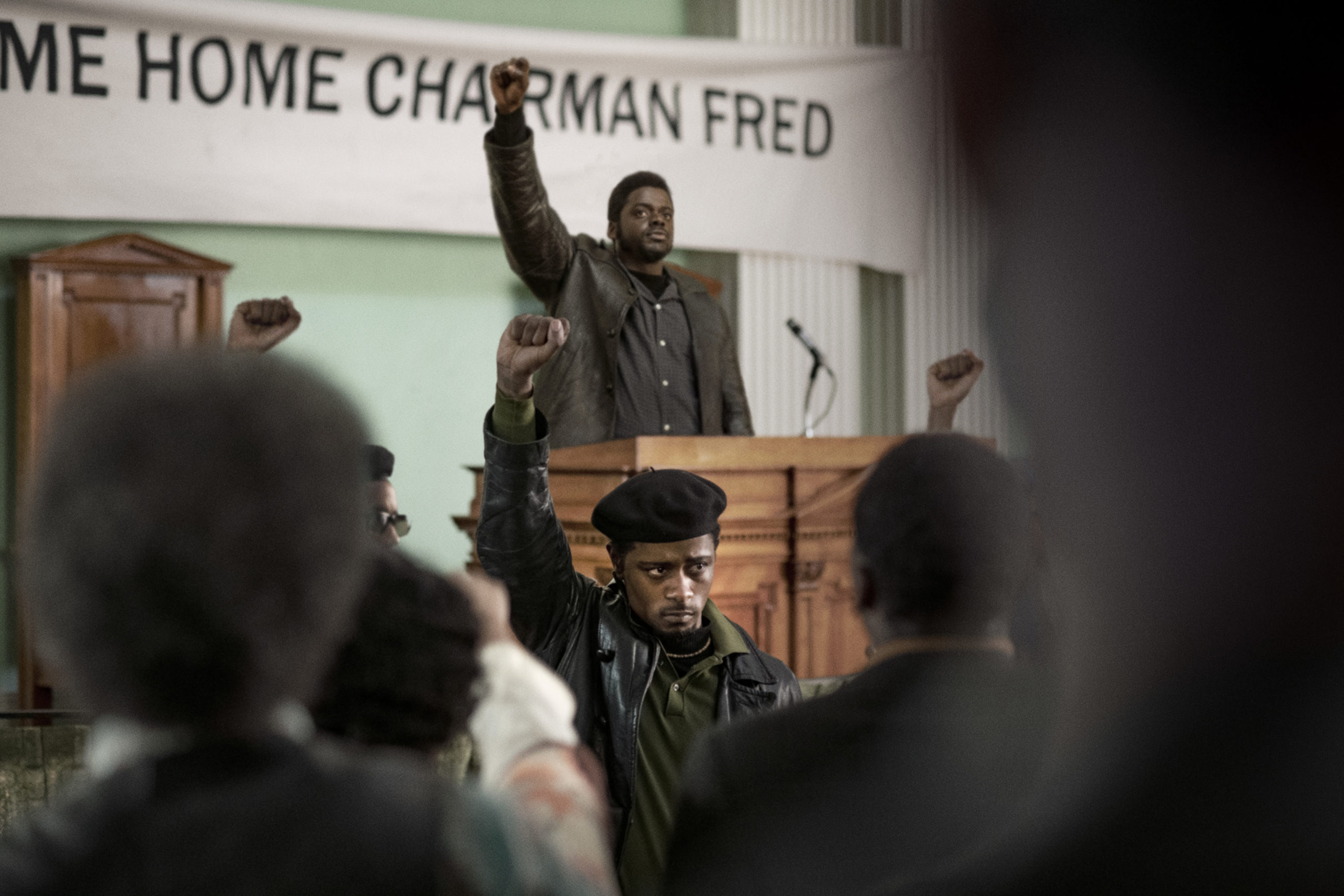 (Center front-back) LaKeith Sanfield as William O’Neal and Daniel Kaluuya as Chairman Fred Hampton in Warner Bros. Pictures’ Judas and the Black Messiah, a Warner Bros. Pictures release. (Photo credit: Glen Wilson)