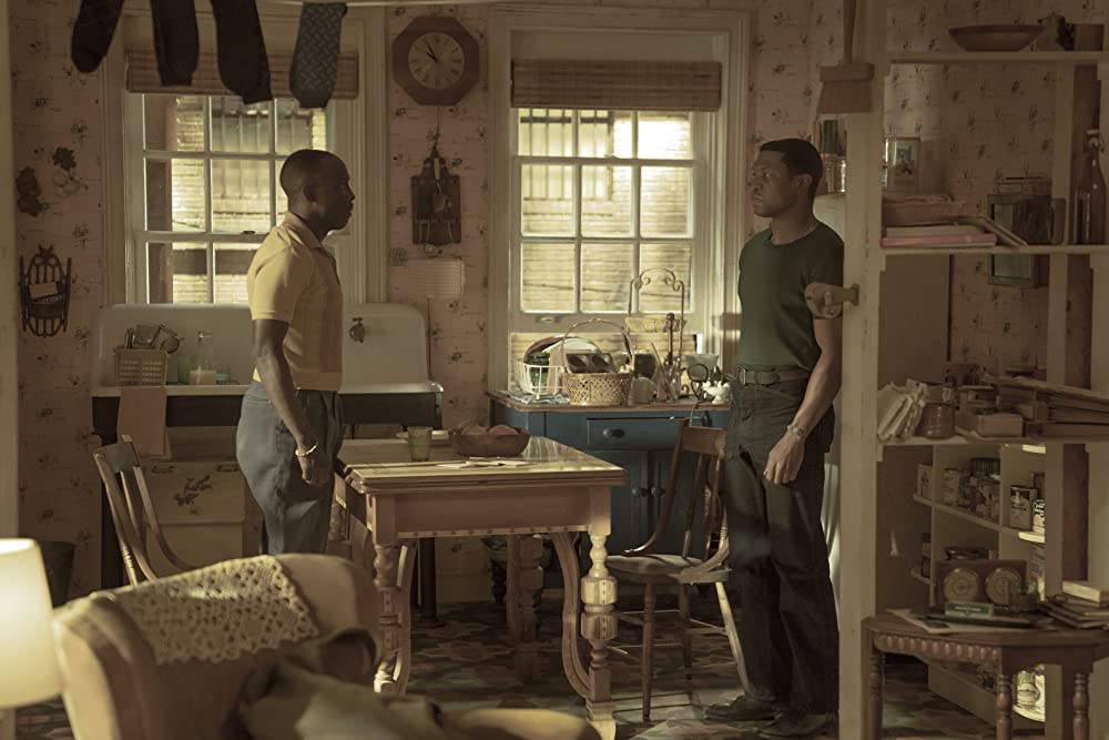 Montrose and Atticus at a standoff in Montrose's kitchen. (Photo credit: HBO)