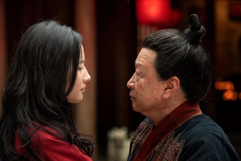 Yifei Liu and Tzi Ma as Mulan and Zhou. (Photo credit: Disney)