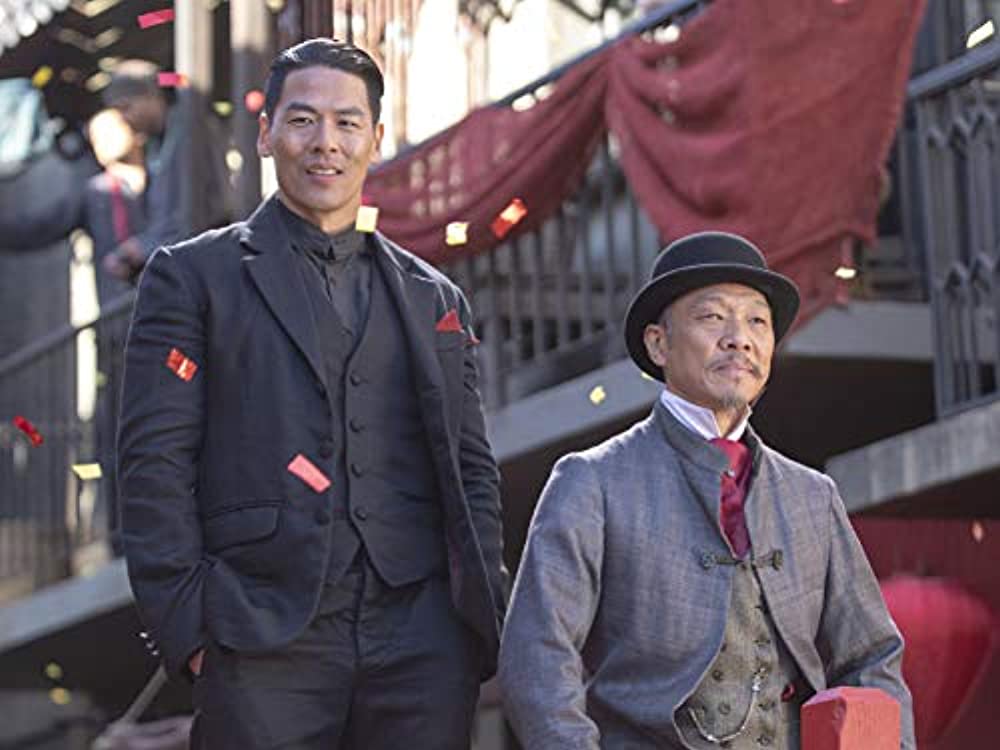 Rich Ting as Hop Wei hatchet man Bolo and Perry Yung as Father Jun. (Photo credit: Cinemax)