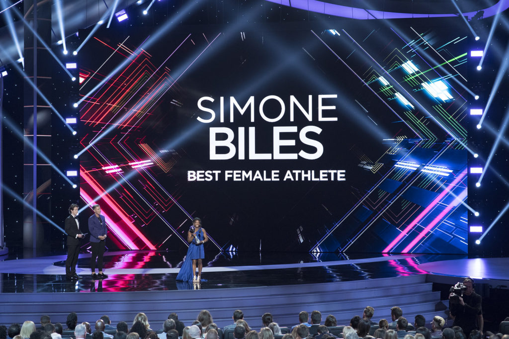 Simone Biles at the 2017 ESPYs, receiving the award for Best Female Athlete (ABC/Image Group LA [Creative Commons license])