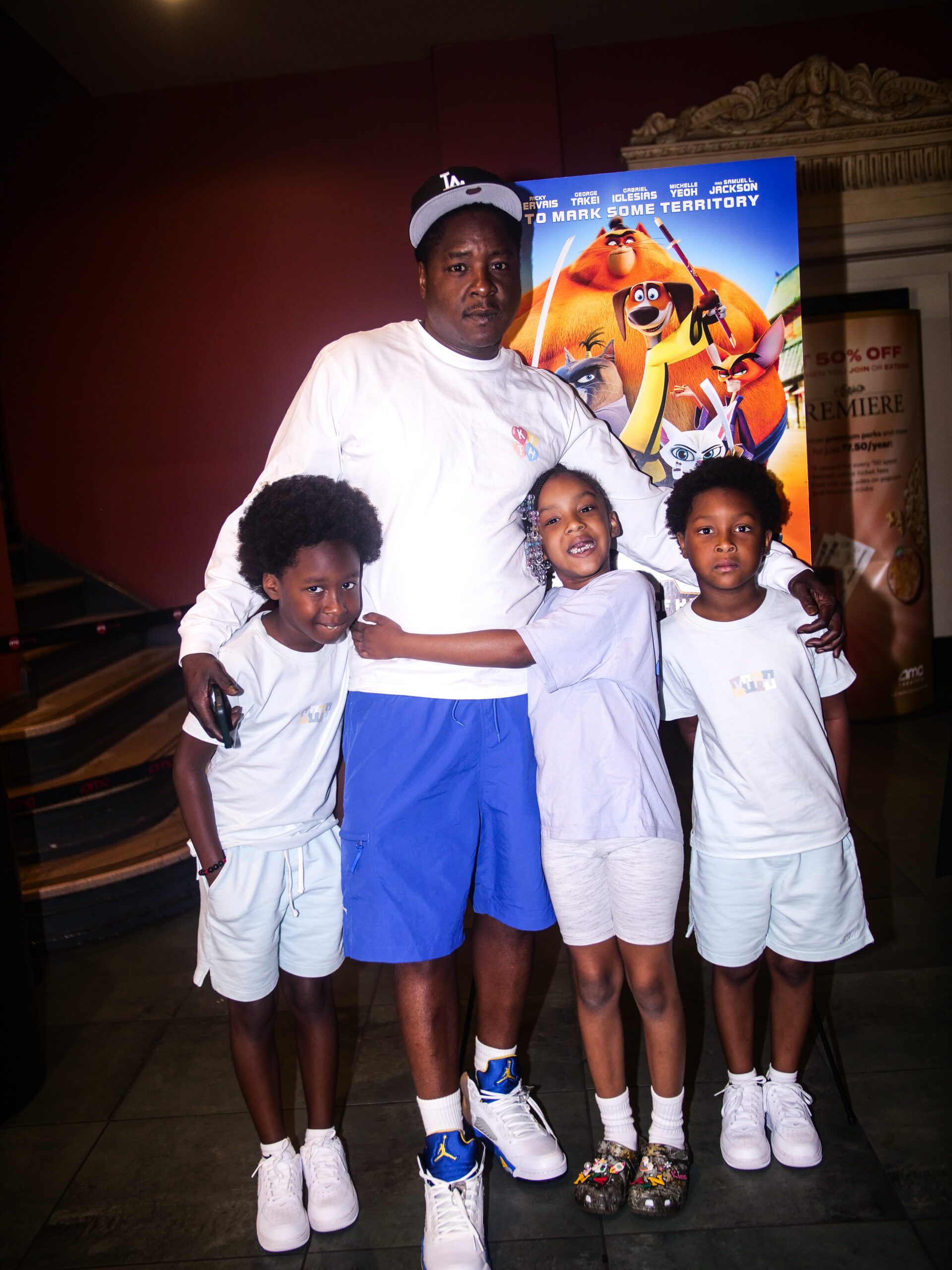 Jadakiss with family at Paws of Fury screening in NYC (Photo credit: Alonzo Gardner)
