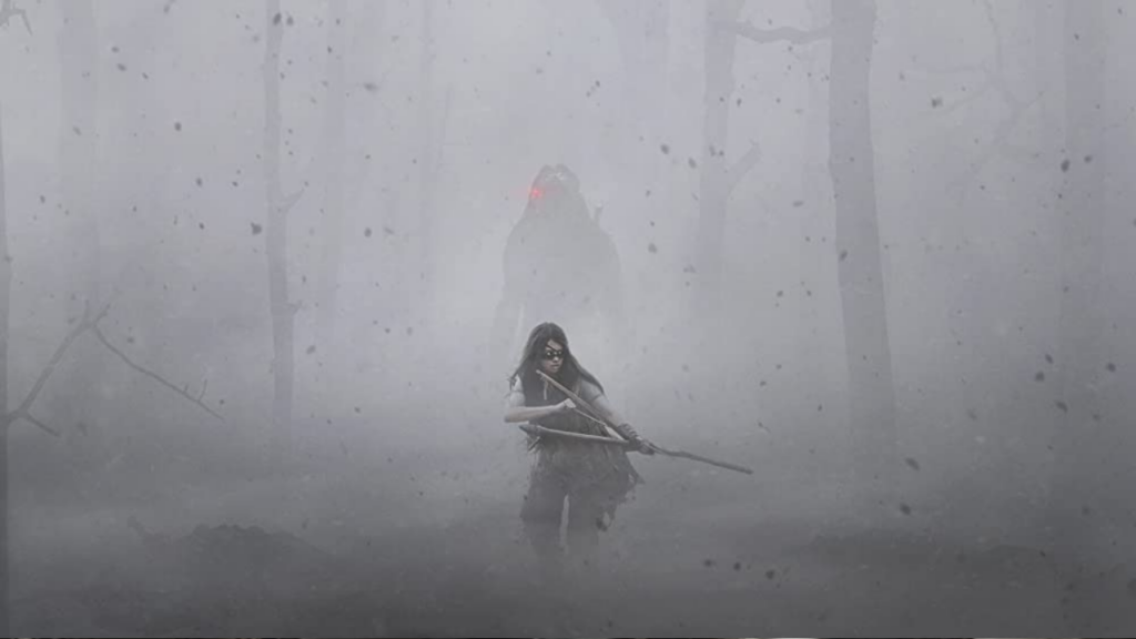 Amber Midthunder as Naru hunting the Predator (Dane DiLiegro), who is hunting her.