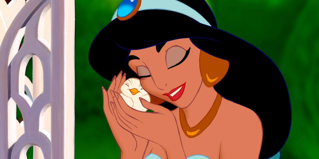 Princess Jasmine was one of the non-white characters I identified with because of a lack of Black female characters in the early '90s. Featured: Jasmine holds a small dove. (Disney)