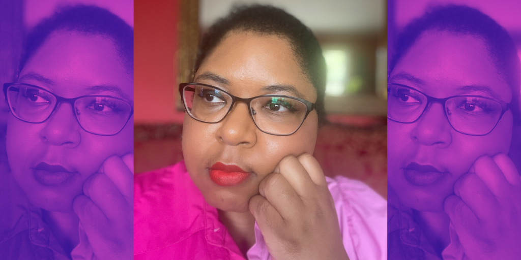 The journey to self-love can be a tough one, but first you have to realize it's necessary. In the image, Monique looks pensively with her hand supporting her face.