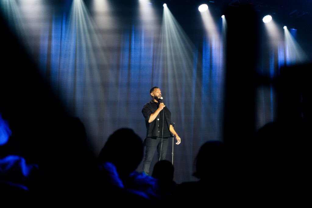 Marlon Wayans wearing black in his special, God Loves Me. (Photo credit: HBO)