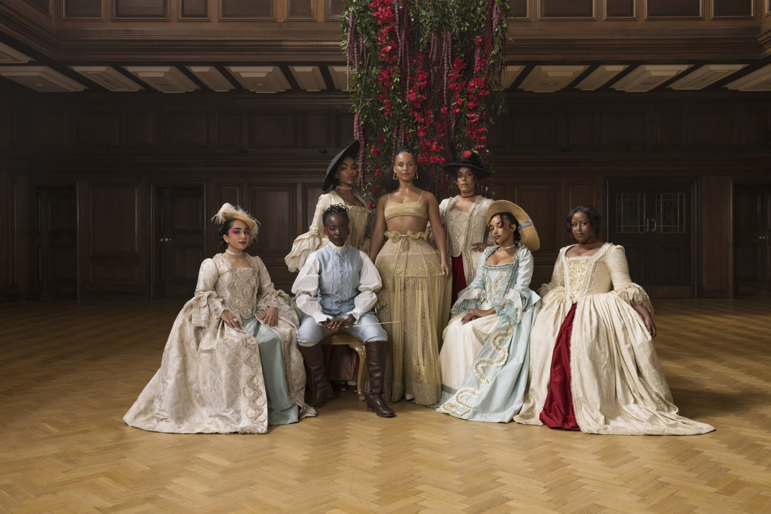 Alicia Keys x Queen Charlotte: A Bridgerton Story Crowning Moment. (L to R) Delara, Ofentse, Alicia Awa, Alicia Keys, Amel Bachair, Rimon, Cherrie in Alicia Keys x Queen Charlotte: A Bridgerton Story Crowning Moment. Cr. The Tyler Twins/Netflix © 2023