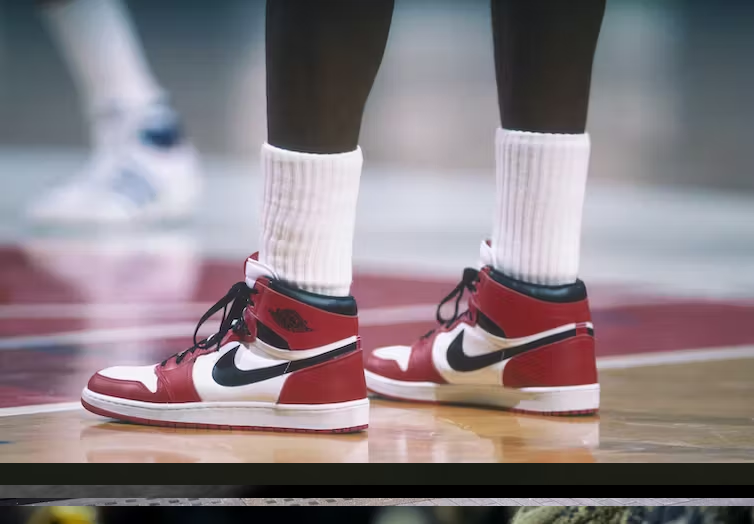 Jordan wears his iconic ‘Air Jordan’ Nike sneakers during a game in 1985. (Focus on Sport/Getty Images)