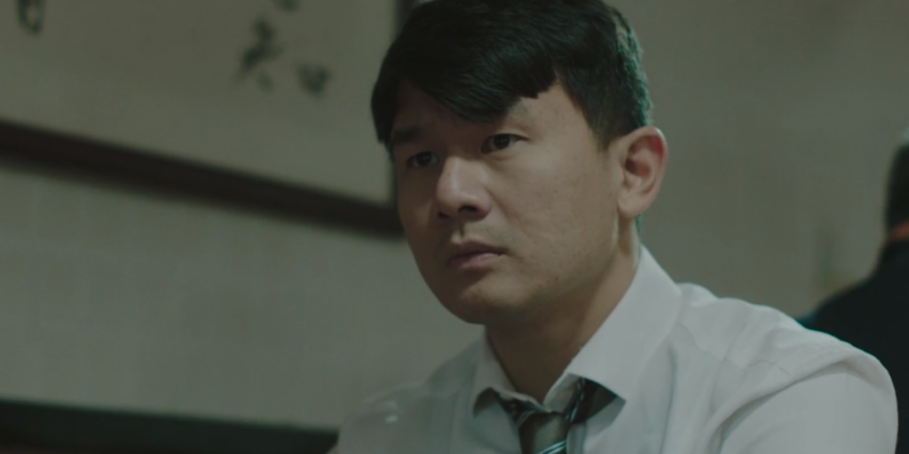 Ronny Chieng as Det. Jack Yu in A Father's Son (Photo credit: Red Rope Productions)