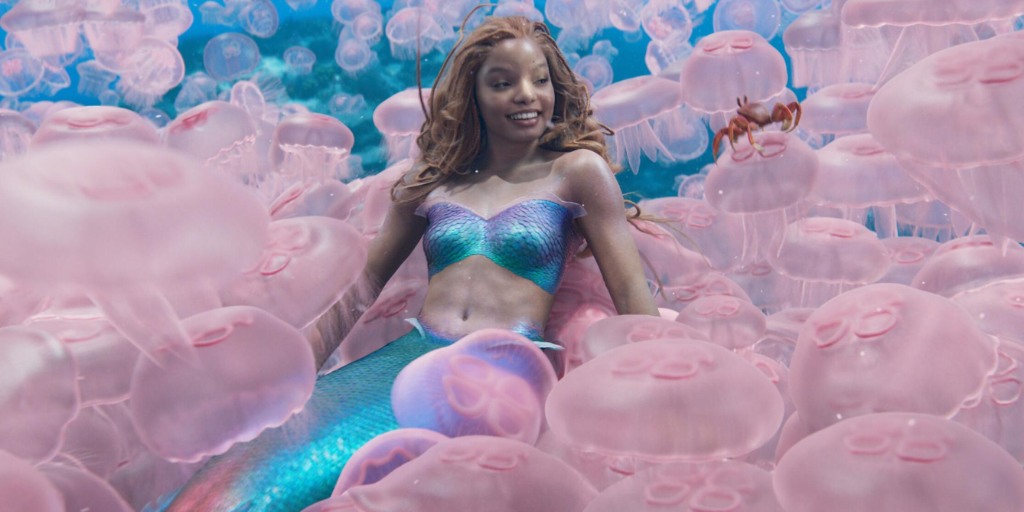 Halle Bailey as Ariel with jellyfish and Sebastian (voiced by Daveed Diggs) (Photo credit: Disney)