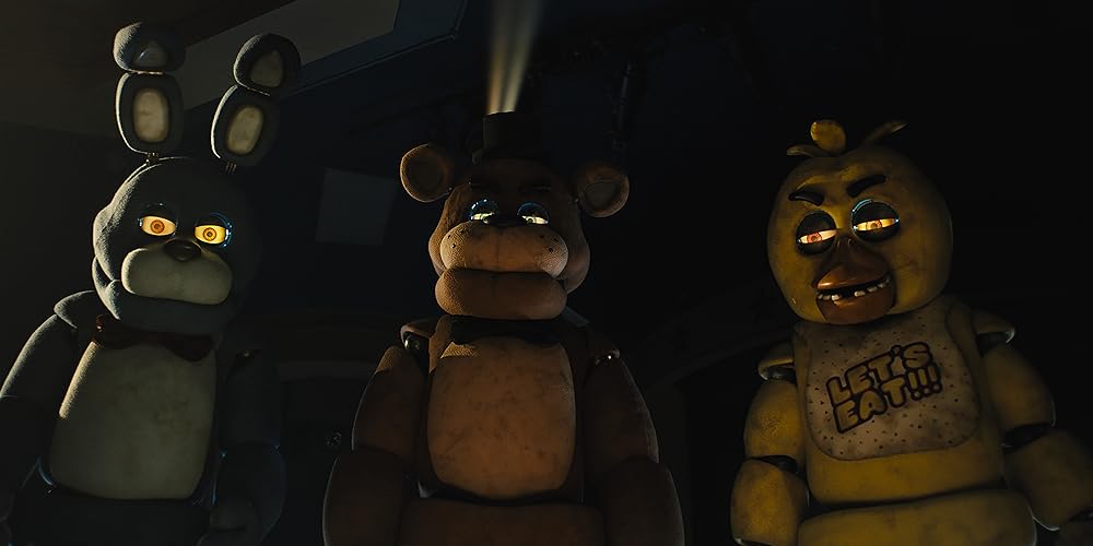 Jade Kindar-Martin, Kevin Foster as Jess Weiss as Bonnie, Freddy and Chica in Five Nights at Freddy's (Photo credit: Blumhouse)