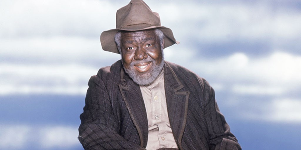 James Baskett as Uncle Remus in Disney's 1946 film Song of the South. He earned an Honorary Oscar in 1948 for his portrayal. He died in the same year. He was ridiculed at the time of the film's release and in the years afterward of his portrayal of Uncle Remus, one of the "happy slaves" in the movie. He was quoted as saying, "I believe that certain groups are doign my race more harm in seeking to create dissension, than can ever possibly come out of the Song of the South."